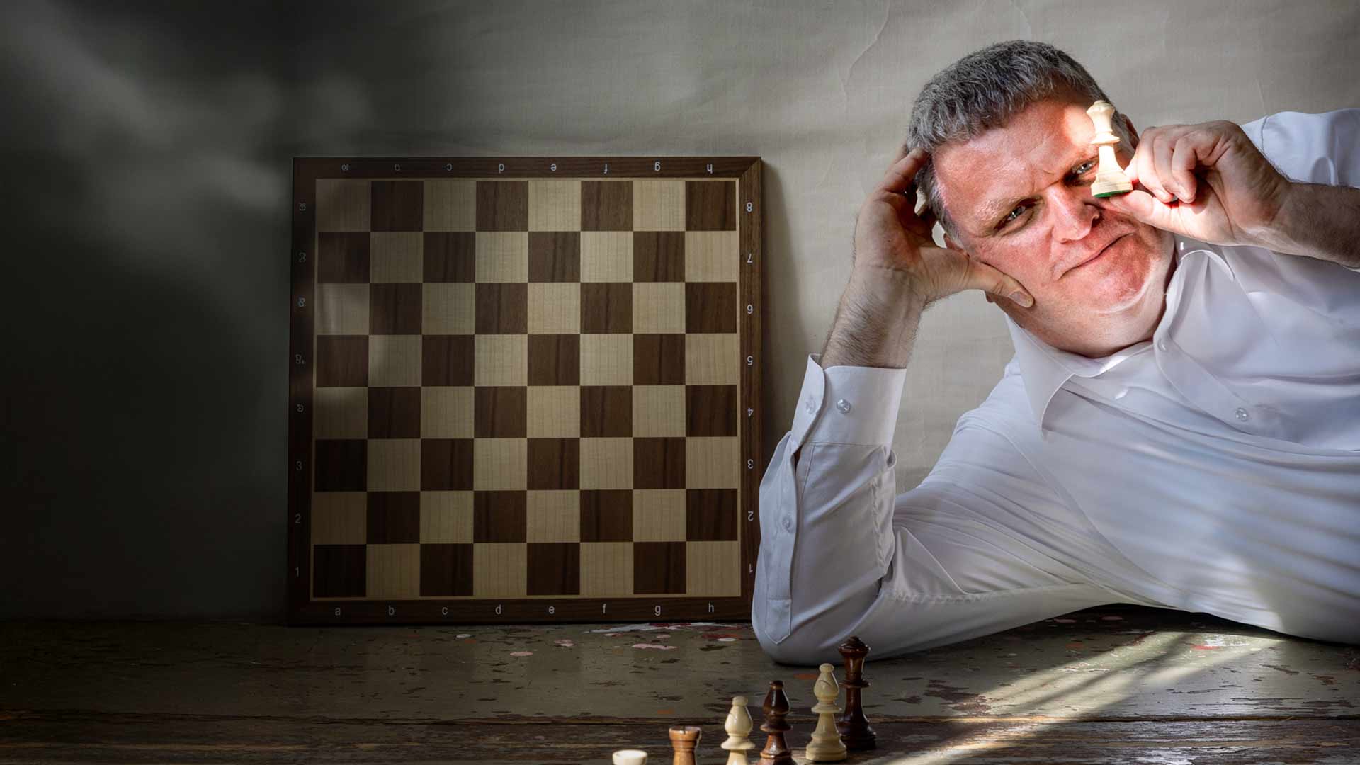 Dr Karsten Wagner - Consulting for Dental - posing with chess pieces