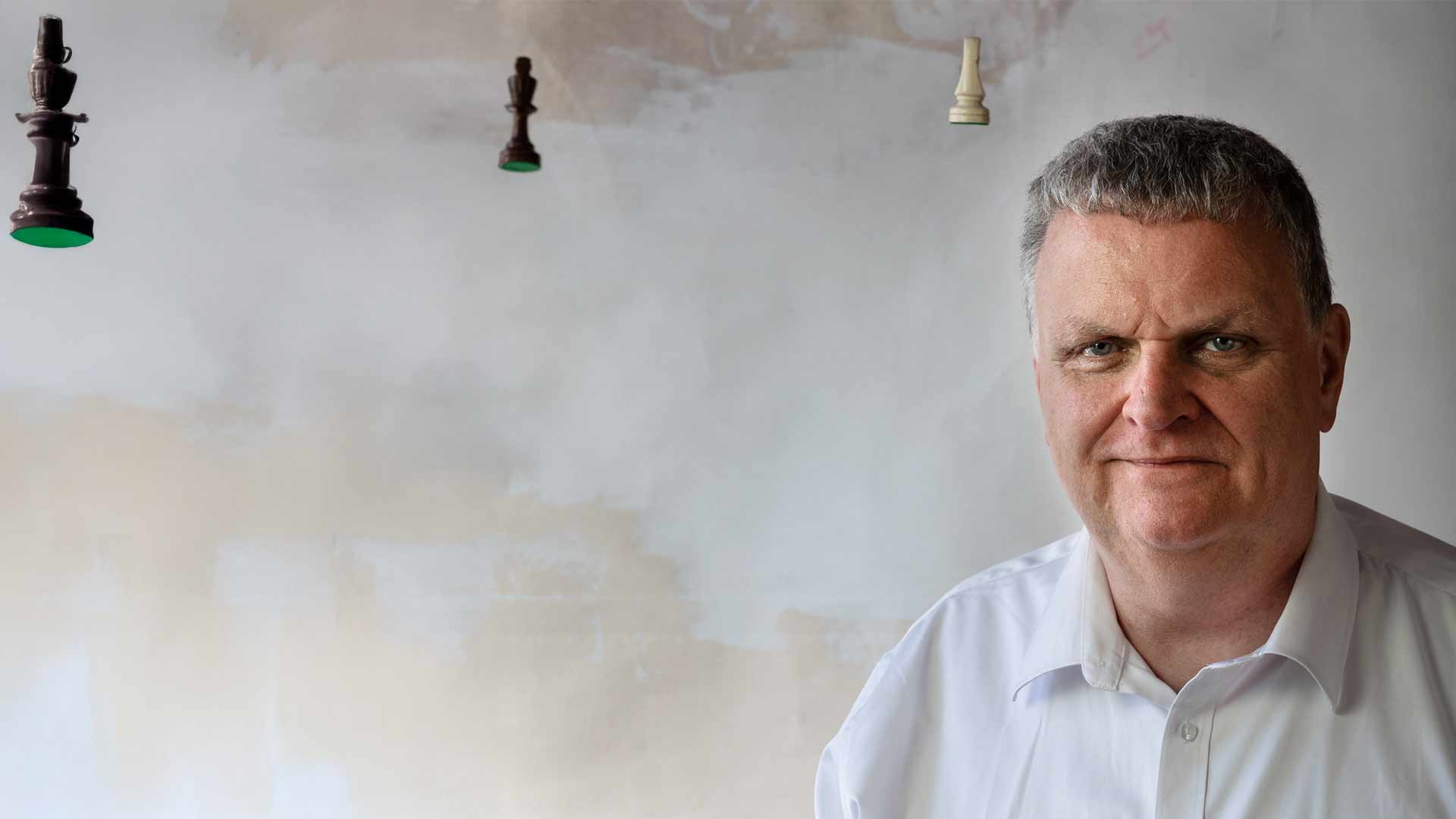 Dr. Karsten Wagner with chess pieces