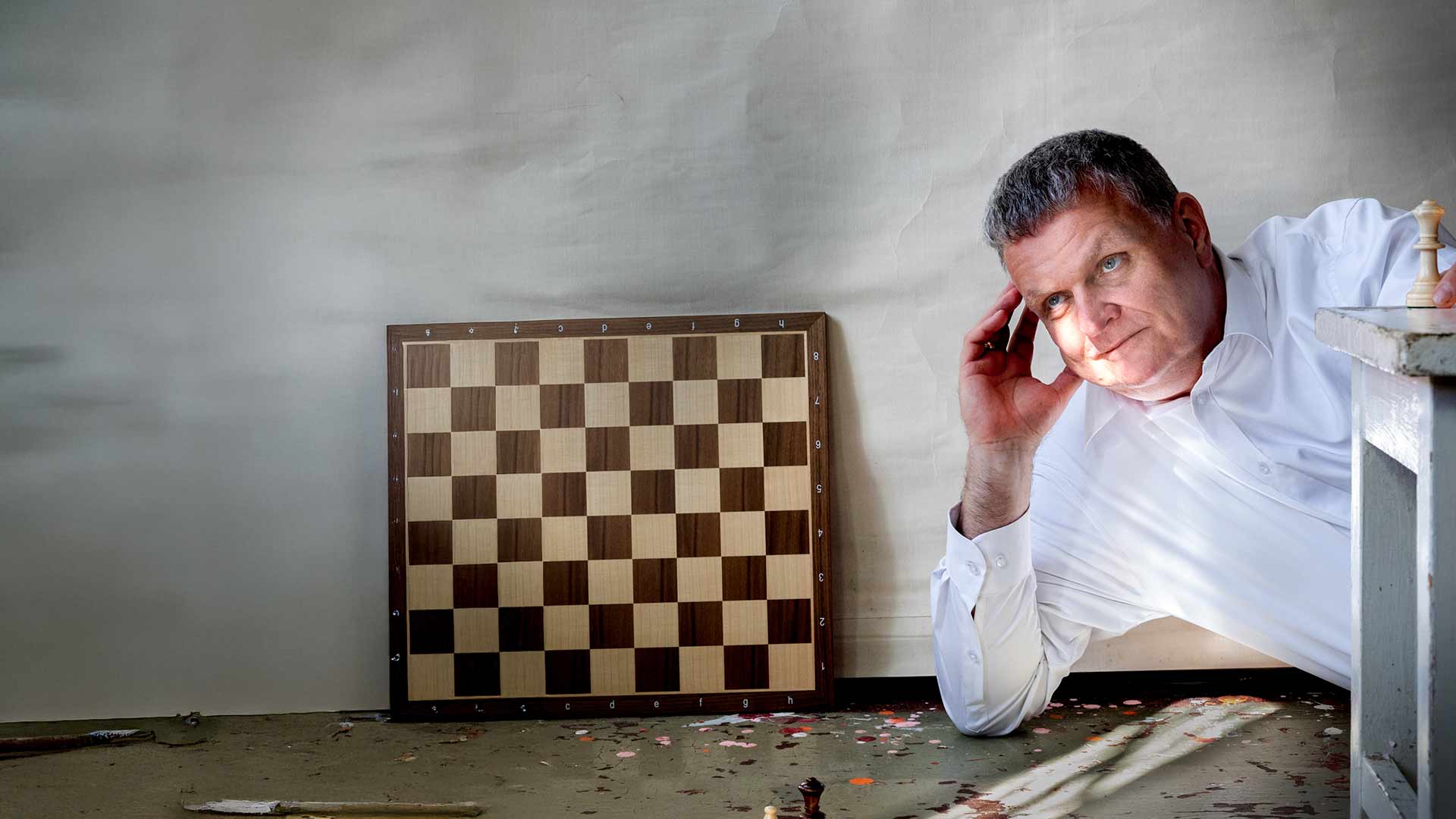 Dr Karsten Wagner - Consulting for Dental - posing with Chessboard
